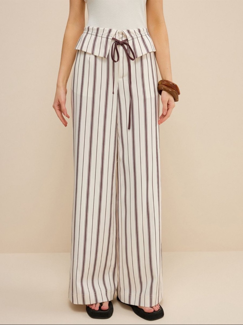 Commense stripped wide-leg pants with peplum waist